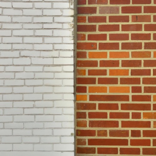 Nettoyage par cryogénie façade briques recouverte de peinture